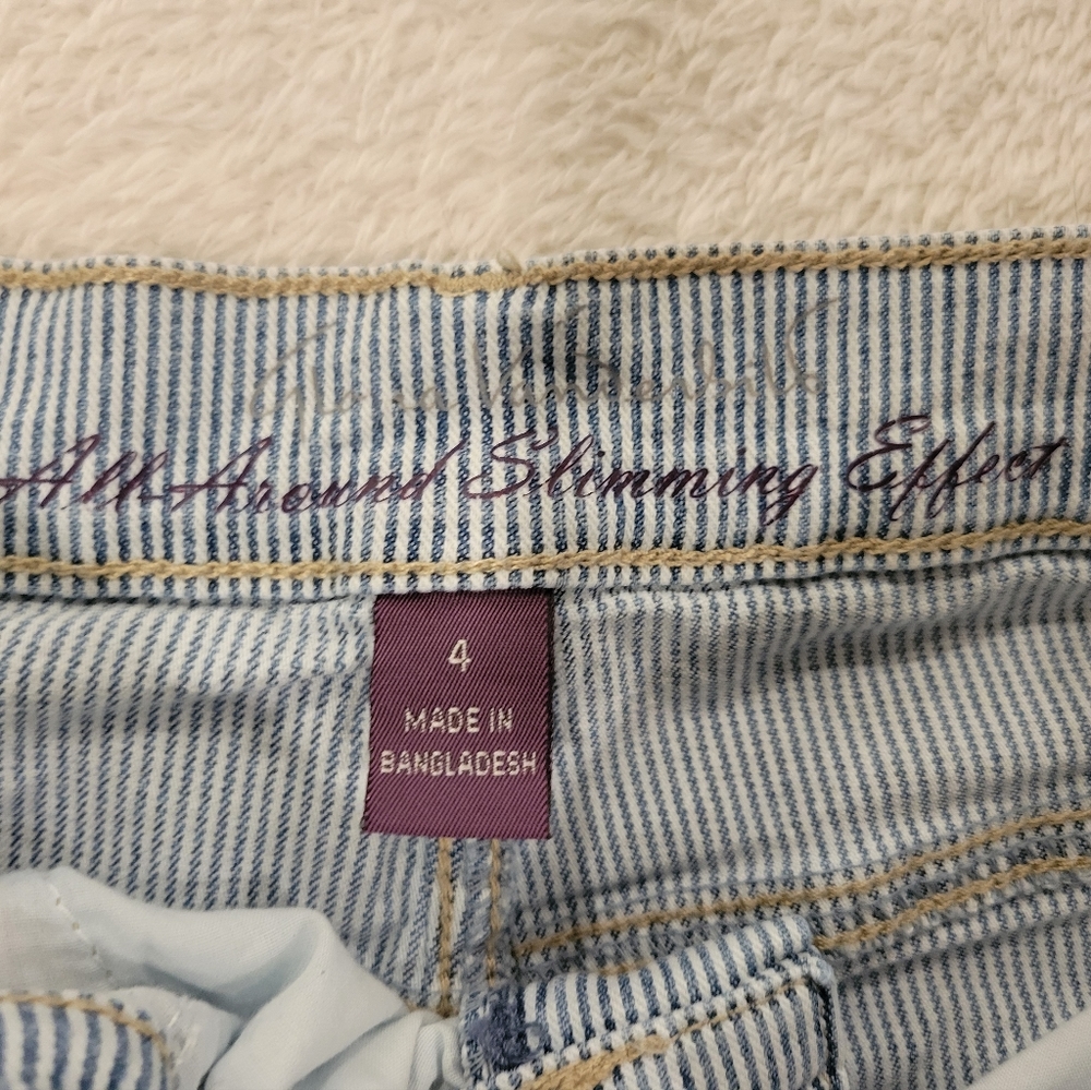 Blue Denim Jeans with Subtle Striped Texture and Dark Stitching